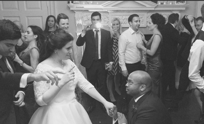 This is our bride and groom in position ready to do the mannequin challenge